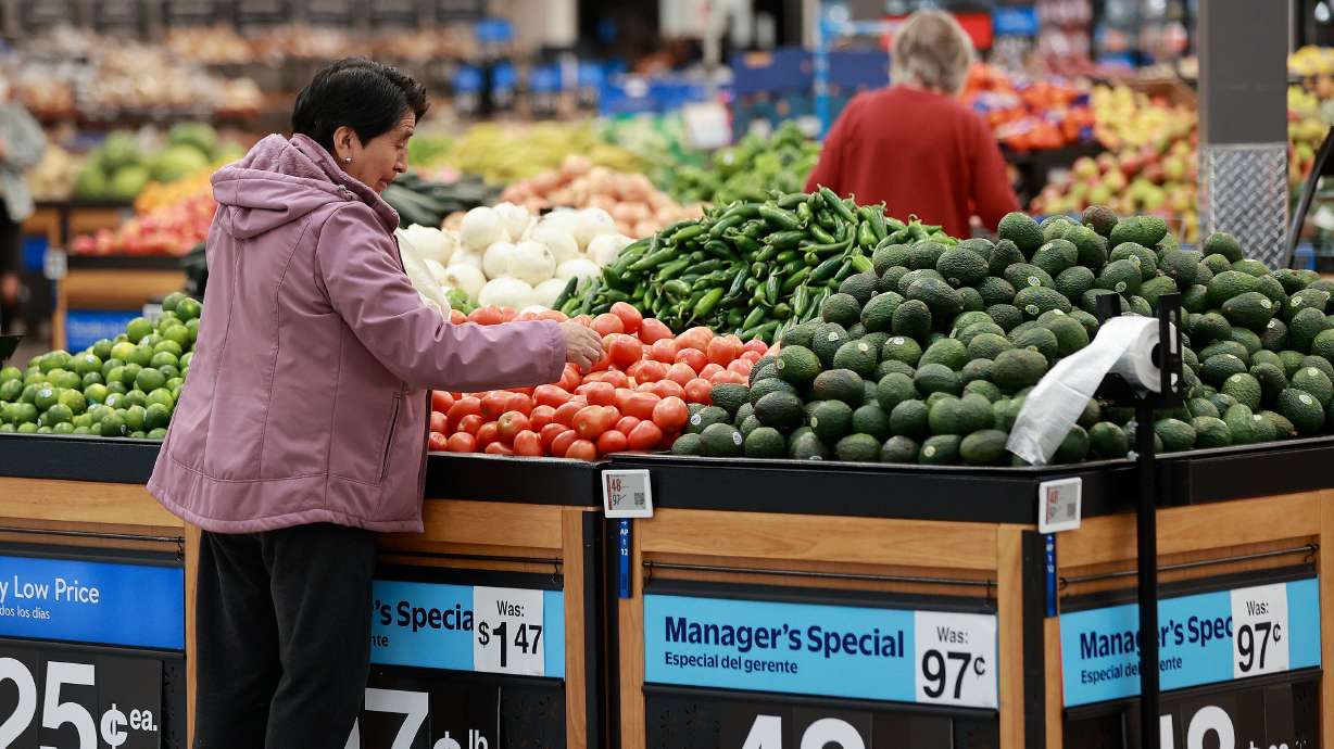 Norma Oscanoa shops for produce at a Walmart Supercenter in West Valley City on Oct. 31.
