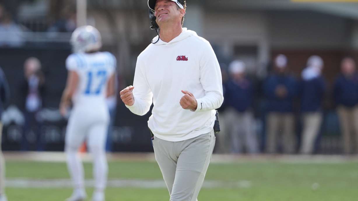 Mississippi head coach Lane Kiffin reacts to a official's call during the second half of an NCAA college football game against Mississippi State, Friday, Nov. 28, 2025, in Starkville, Miss.