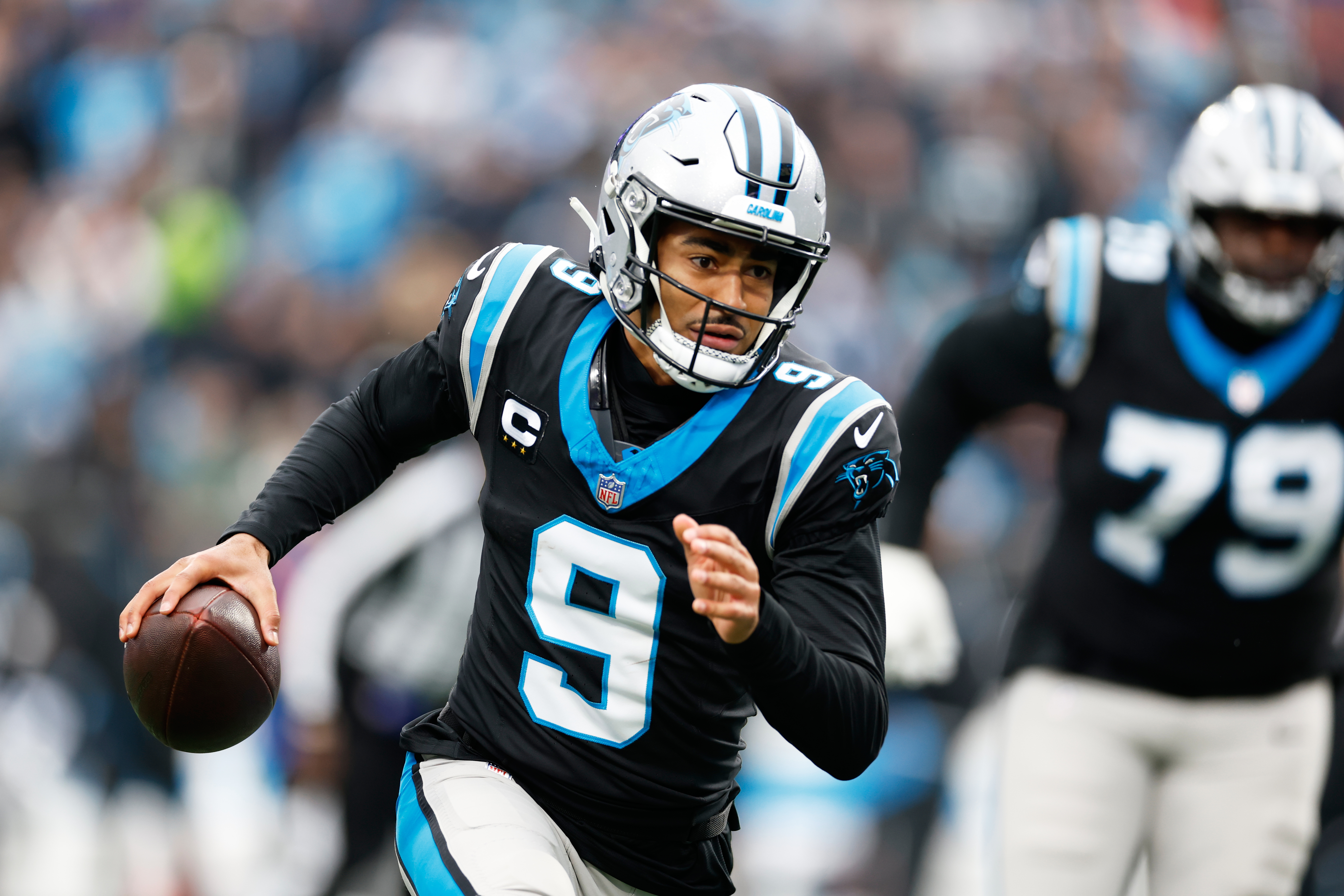 Carolina Panthers quarterback Bryce Young runs against the Los Angeles Rams during the first half of an NFL football game, Sunday, Nov. 30, 2025, in Charlotte, N.C. 