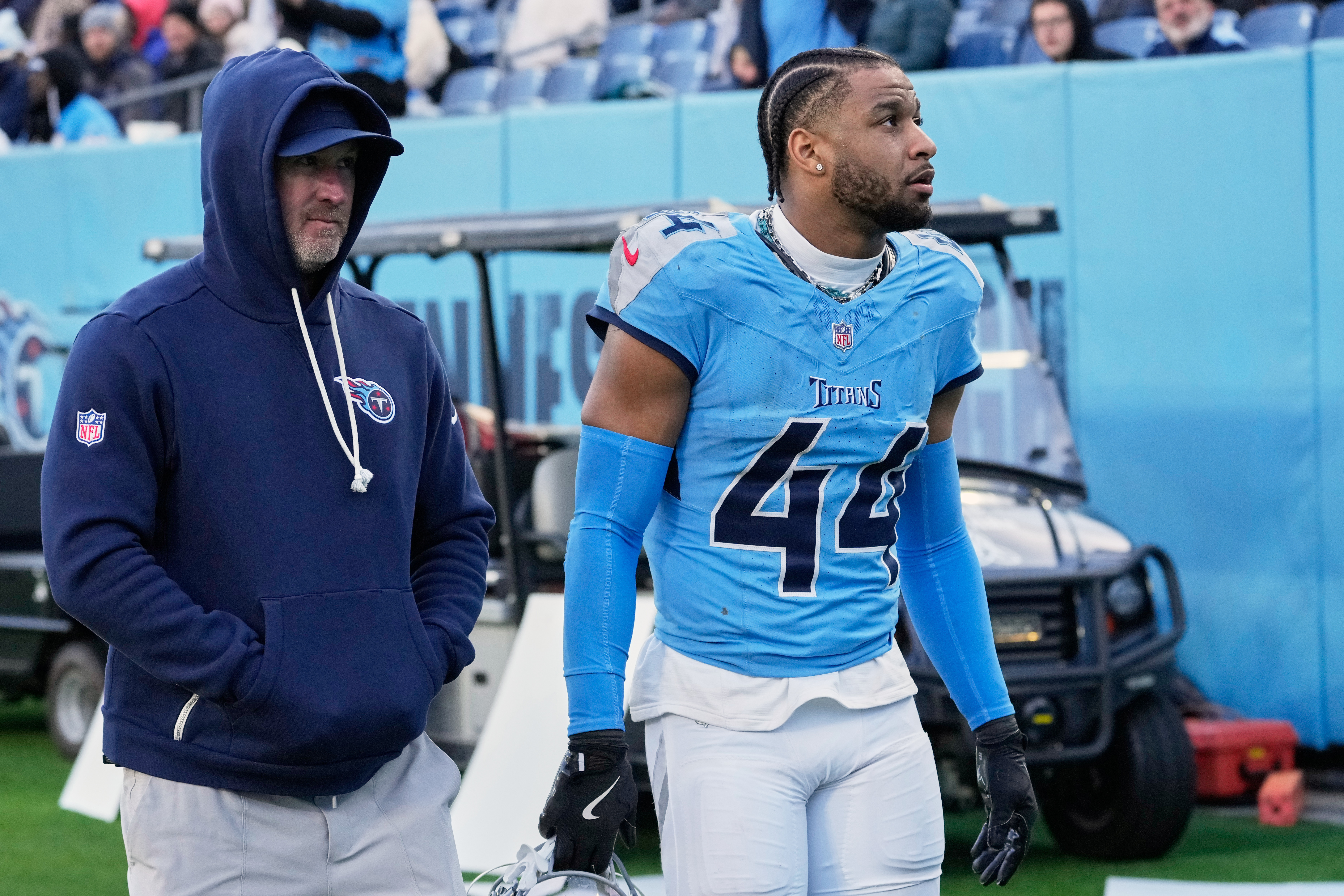 Tennessee Titans safety Mike Brown (44) leaves the field after he was ejected from an NFL football game between the Tennessee Titans and the Jacksonville Jaguars Sunday, Nov. 30, 2025, in Nashville, Tenn. 