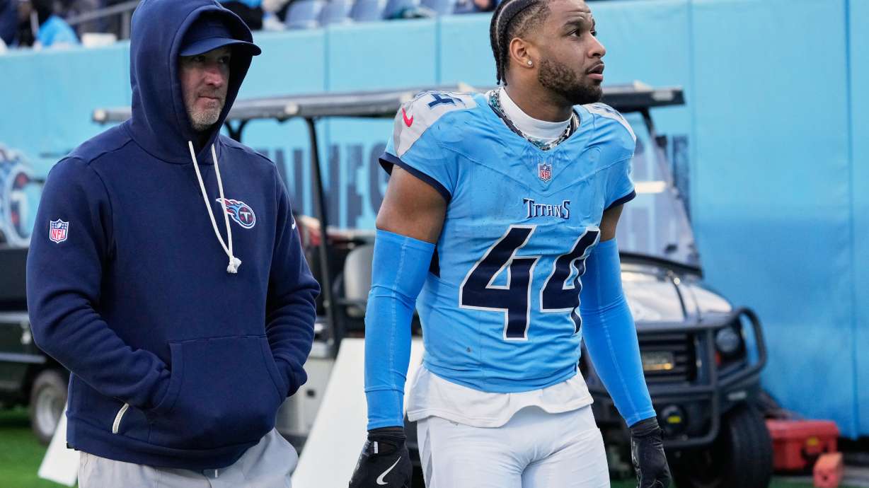 Tennessee Titans safety Mike Brown (44) leaves the field after he was ejected from an NFL football game between the Tennessee Titans and the Jacksonville Jaguars Sunday, Nov. 30, 2025, in Nashville, Tenn.