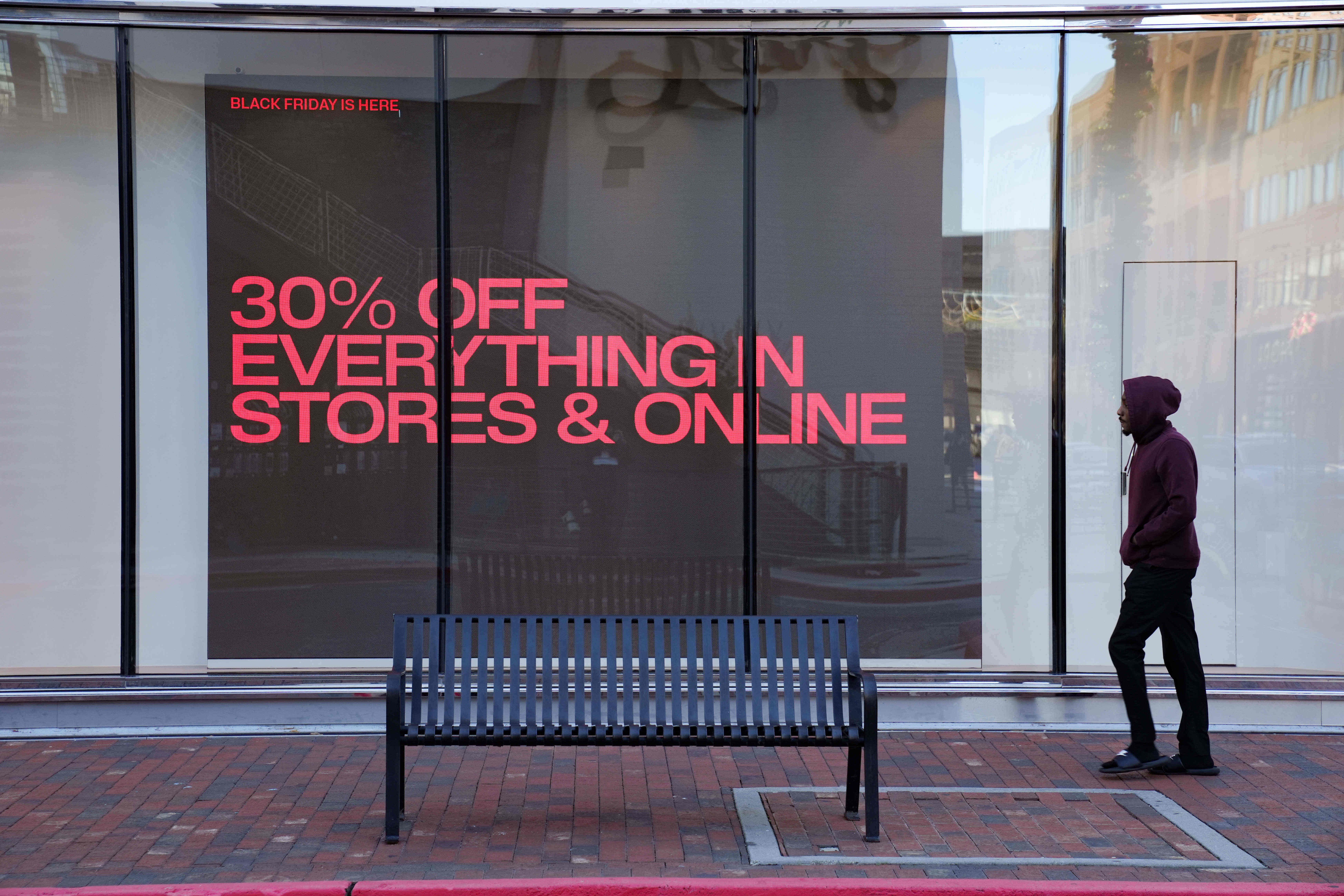 Shoppers browse for Black Friday deals at Atlantic Station outdoor mall, Friday, in Atlanta. Deals promoted as some of the best of the holiday season are expected to keep people across the United States glued to their computers and smartphones as the post-Thanksgiving shopping marathon wraps up on Cyber Monday.