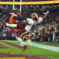 Catch of the year? Commanders' Treylon Burks makes incredible 1-handed TD grab vs. Broncos