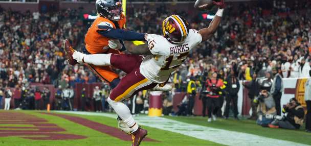 Catch of the year? Commanders' Treylon Burks makes incredible 1-handed TD grab vs. Broncos