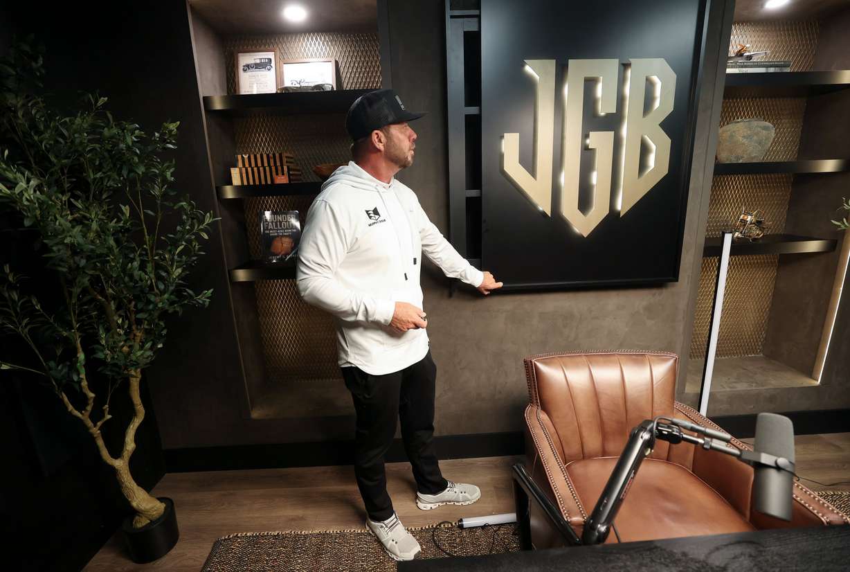 Jeremy Barker, Murphy Door founder and CEO, shows hidden storage at Murphy Door in Ogden on Oct. 21.