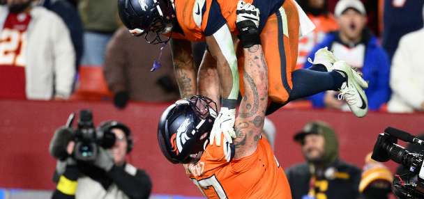Nik Bonitto bats away 2-point try in OT and Broncos escape with 27-26 win over Commanders