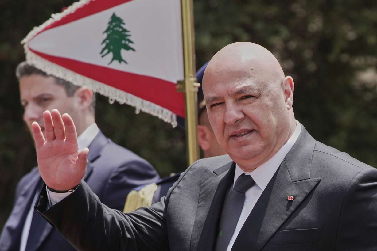 Lebanese President Joseph Aoun gestures to journalists at the Presidential Palace, in Baabda, east of Beirut, May 21, 2025. Aoun praised the signing of a framework agreement seen as a "first step" toward peace on Friday.