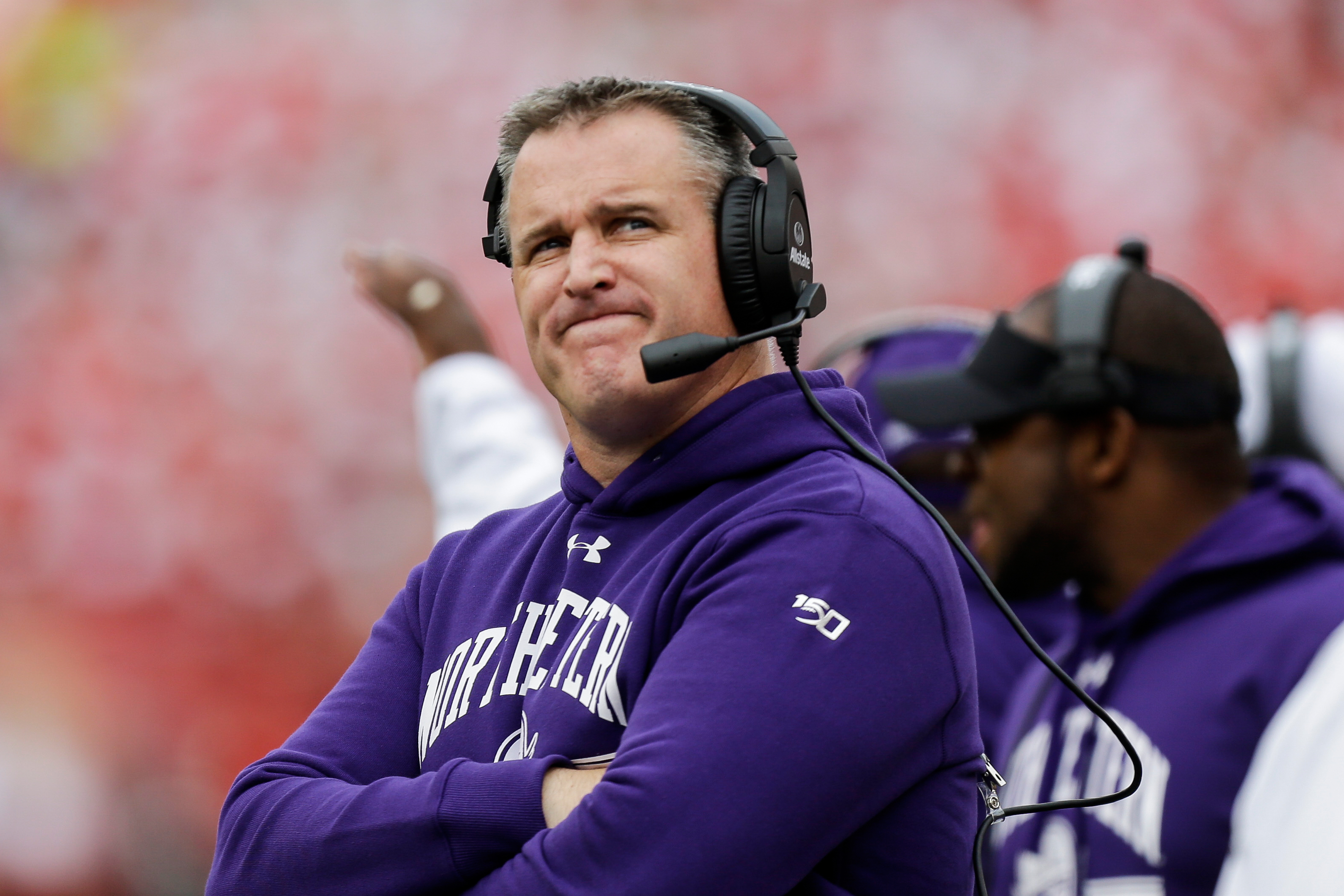 FILE - Northwestern head coach Pat Fitzgerald looks up on the sideline during the first half of an NCAA college football game against Wisconsin Saturday, Sept. 28, 2019, in Madison, Wis. 