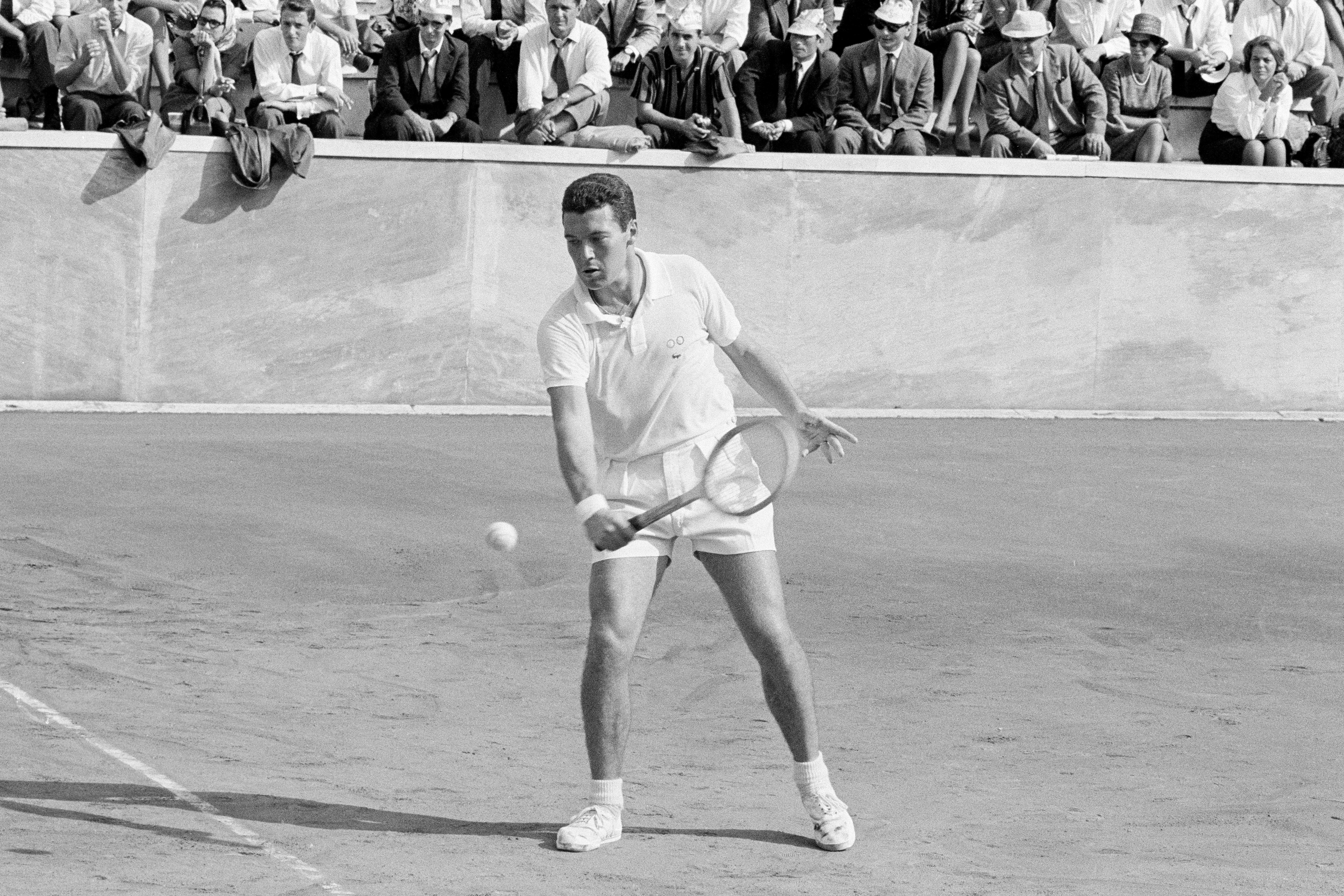 FILE - Italy's Nicola Pietrangeli in action during his Davis Cup singles tennis match against United States' Jon Douglas, in Rome, Oct. 16, 1961.