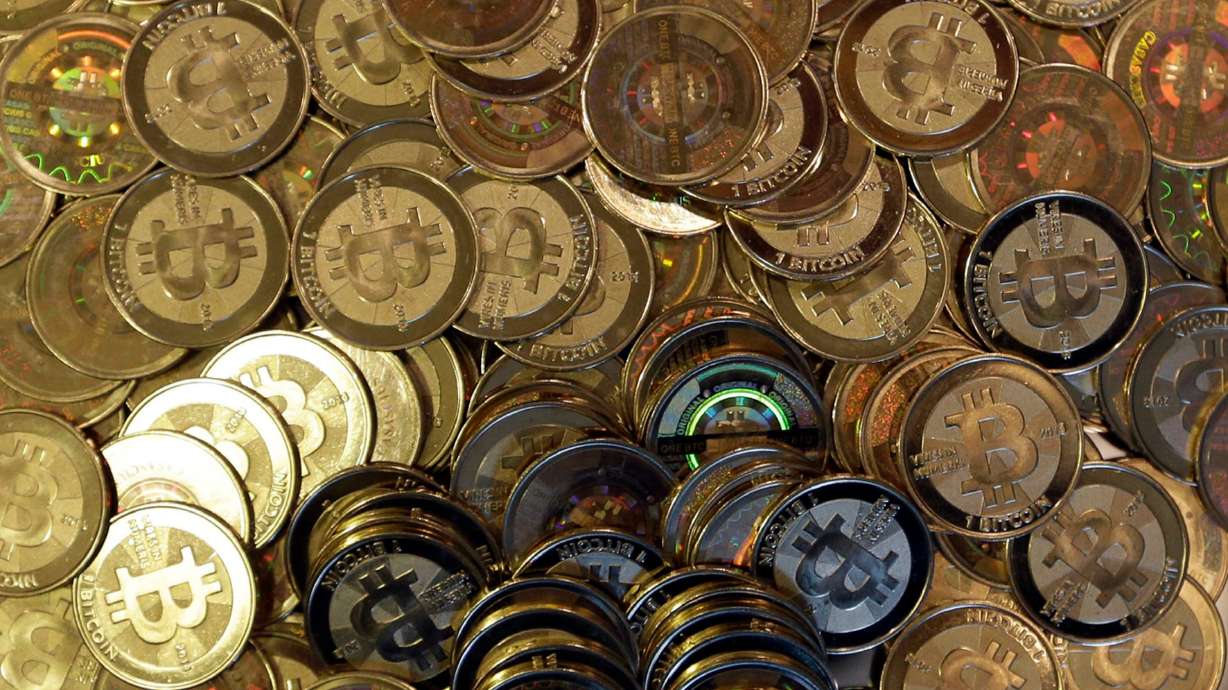 Bitcoin and companies tied to cryptocurrencies extended a nearly two-month swoon Monday, tracking with a broader market sell-off in technology companies that many see as overvalued.