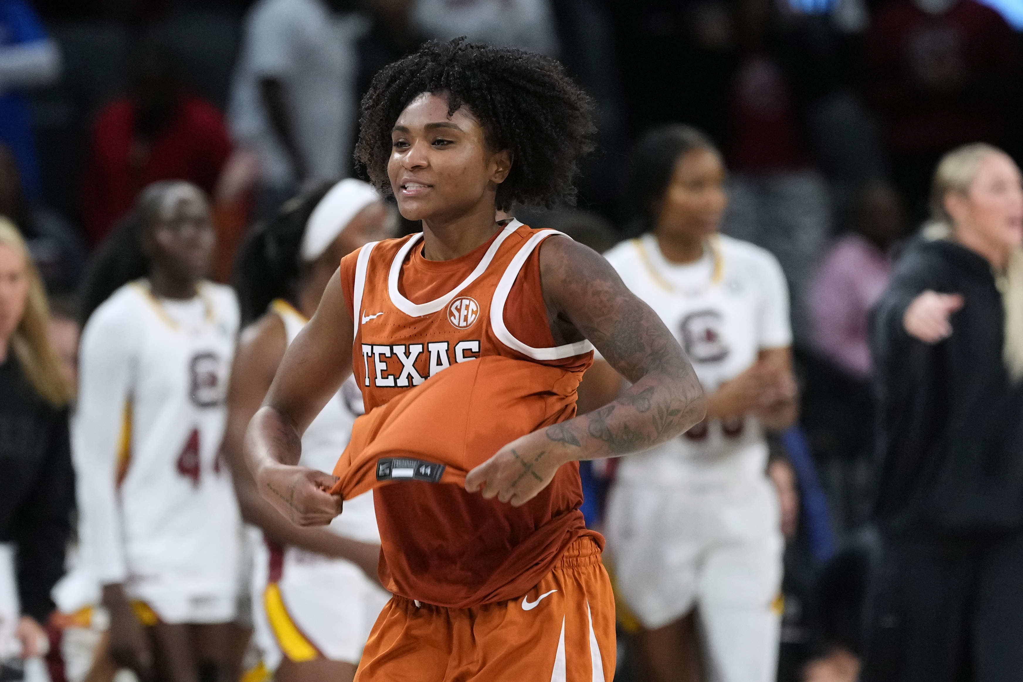 Texas guard Rori Harmon (3) celebrates the team's win over South Carolina in an NCAA college basketball game in the Players Era tournament in Las Vegas, Thursday, Nov. 27, 2025. 