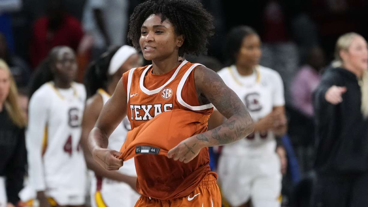 Texas guard Rori Harmon (3) celebrates the team's win over South Carolina in an NCAA college basketball game in the Players Era tournament in Las Vegas, Thursday, Nov. 27, 2025.
