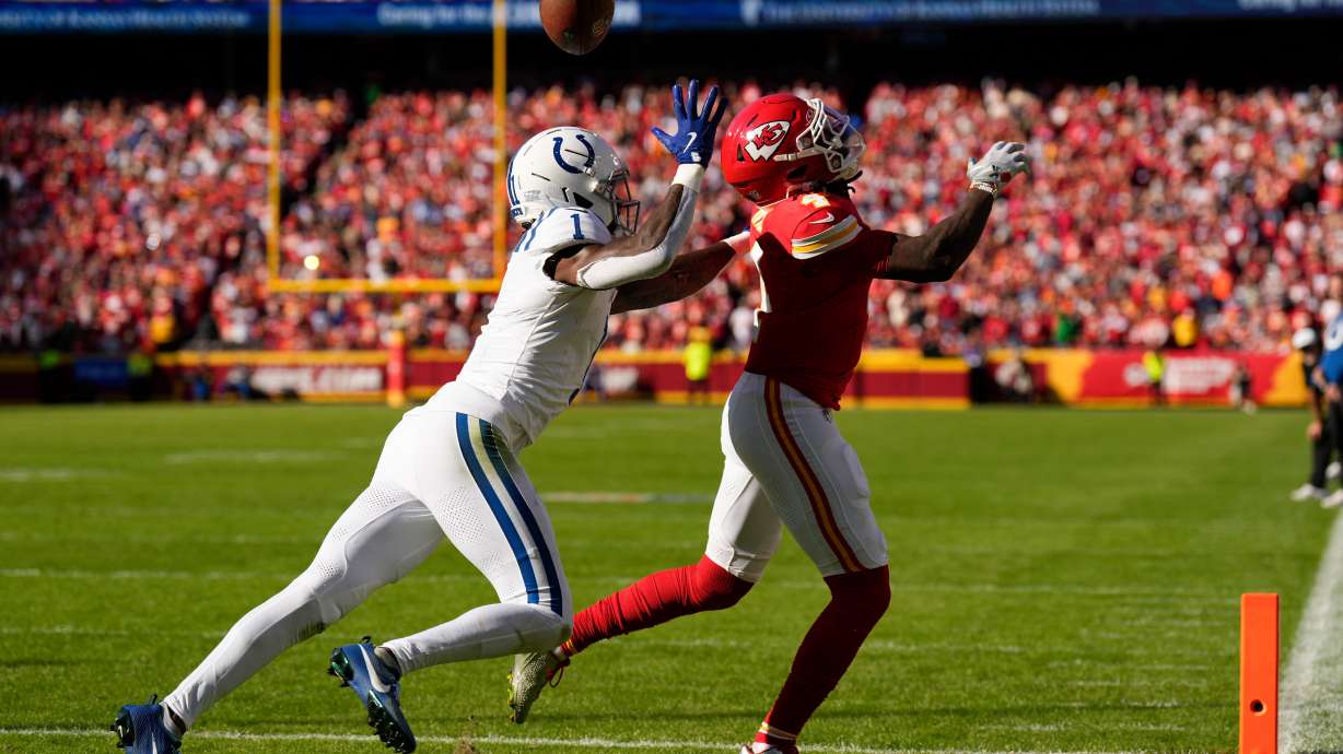 Indianapolis Colts cornerback Sauce Gardner (1) breaks up a pass to Kansas City Chiefs wide receiver Rashee Rice (4) during the first half of an NFL football game Sunday, Nov. 23, 2025, in Kansas City, Mo.