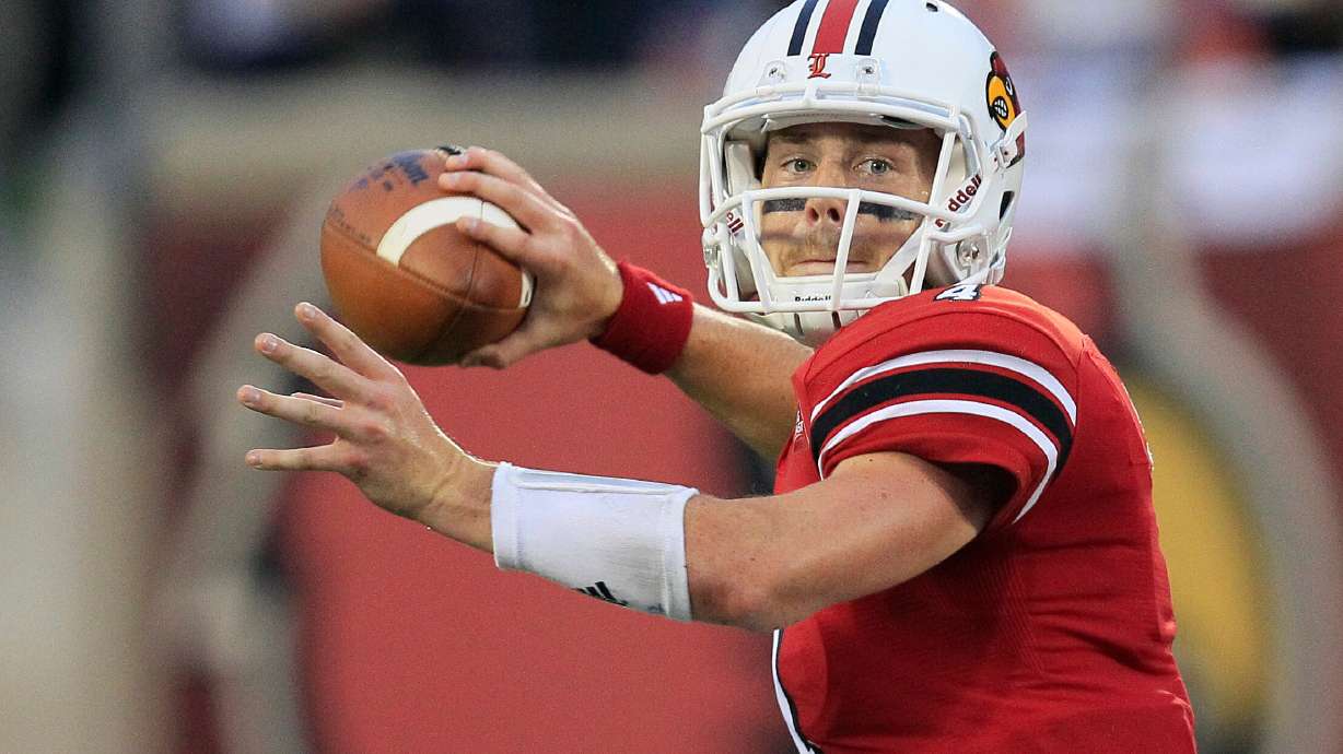 FILE - Louisville quarterback Will Stein readies a pass during the first half of their NCAA college football game against Florida International, Sept. 9, 2011, in Louisville, Ky.