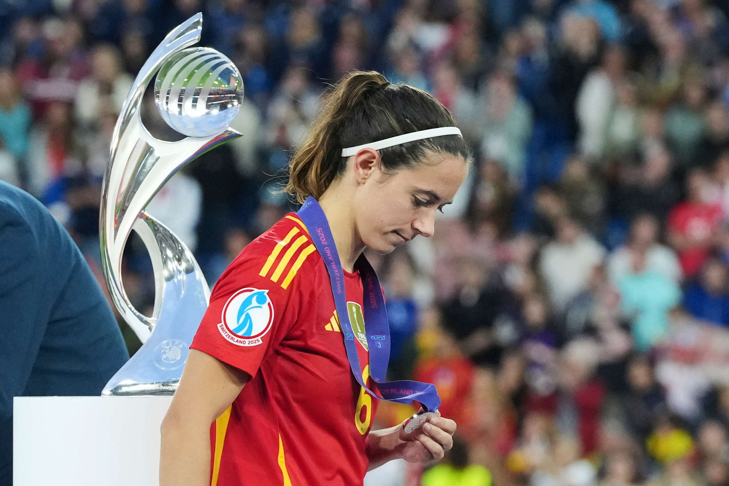 FILE - Spain's Aitana Bonmati walks past the trophy with her runners up medal after the Women's Euro 2025 final soccer match between England and Spain at St. Jakob-Park in Basel, Switzerland, Sunday, July 27, 2025.