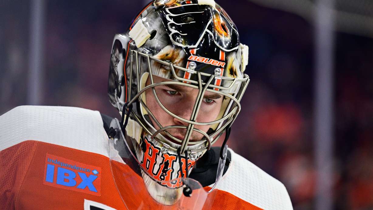 FILE - Philadelphia Flyers' goaltender Carter Hart in action during an NHL hockey game against the Colorado Avalanche, Jan. 20, 2024, in Philadelphia.