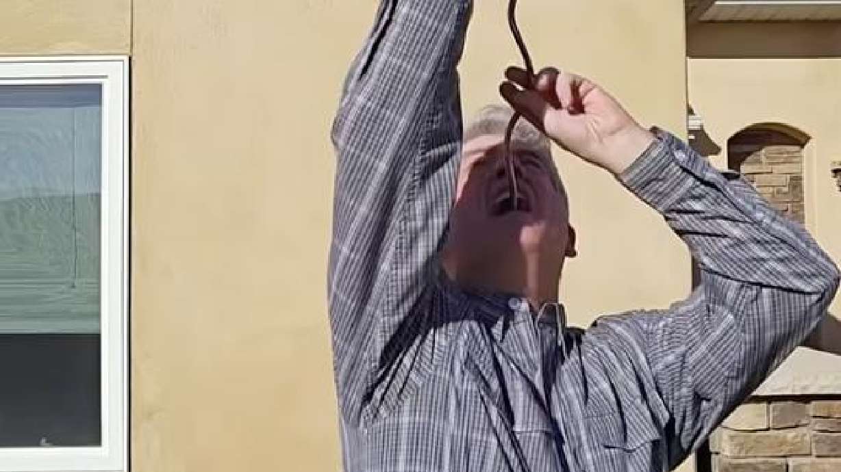 Brad Byers tries to swallow what he calls a "giant corkscrew" in this video.