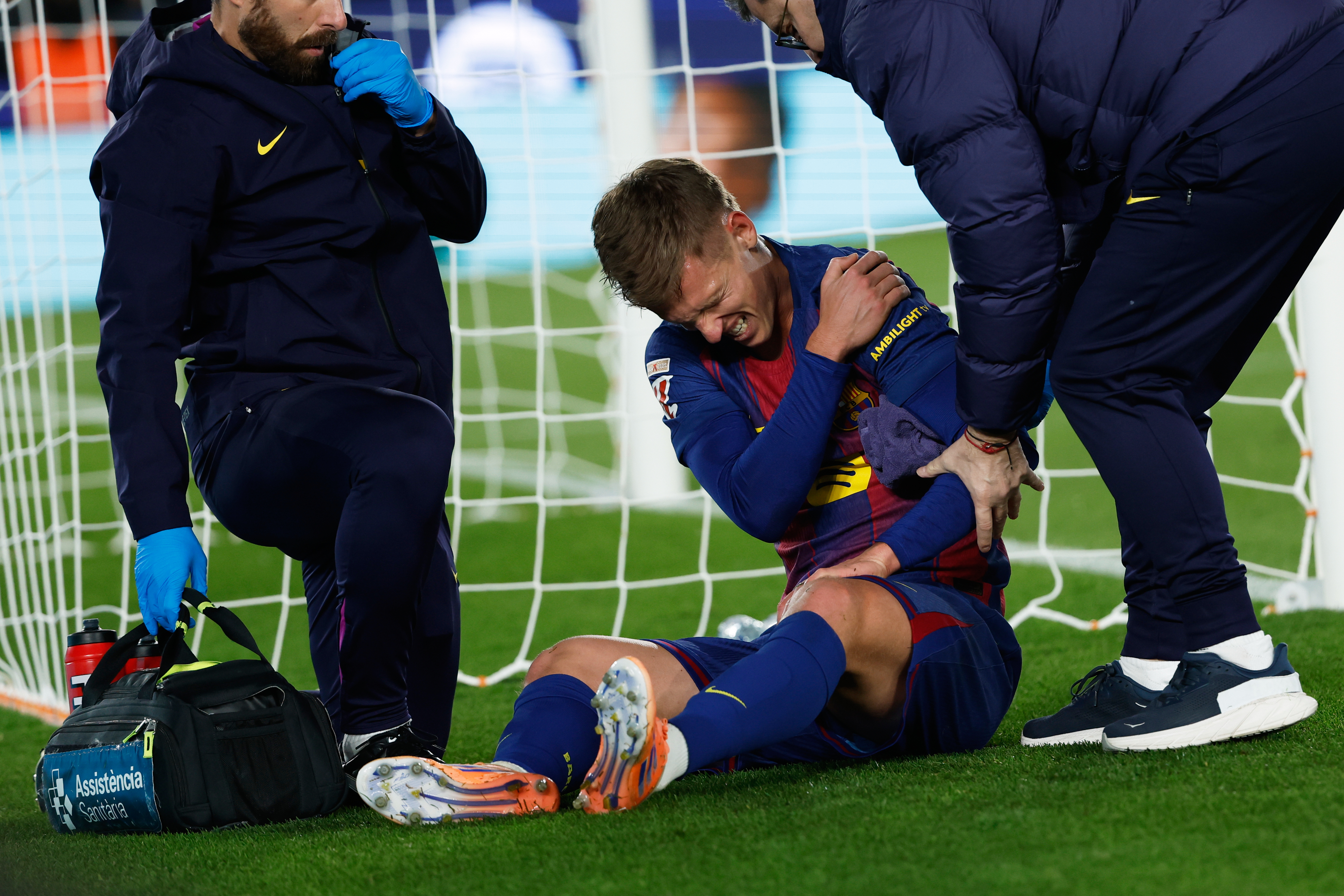 Dani Olmo scores and gets injured as Barcelona beats Atletico Madrid 3-1