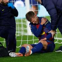 Dani Olmo scores and gets injured as Barcelona beats Atletico Madrid 3-1