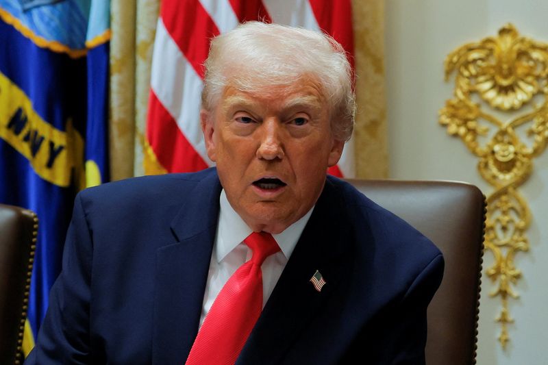 President Donald Trump attends a cabinet meeting at the White House in Washington, Tuesday. Trump said he felt "very good" about his pardon of former Honduran President Juan Orlando Hernandez.