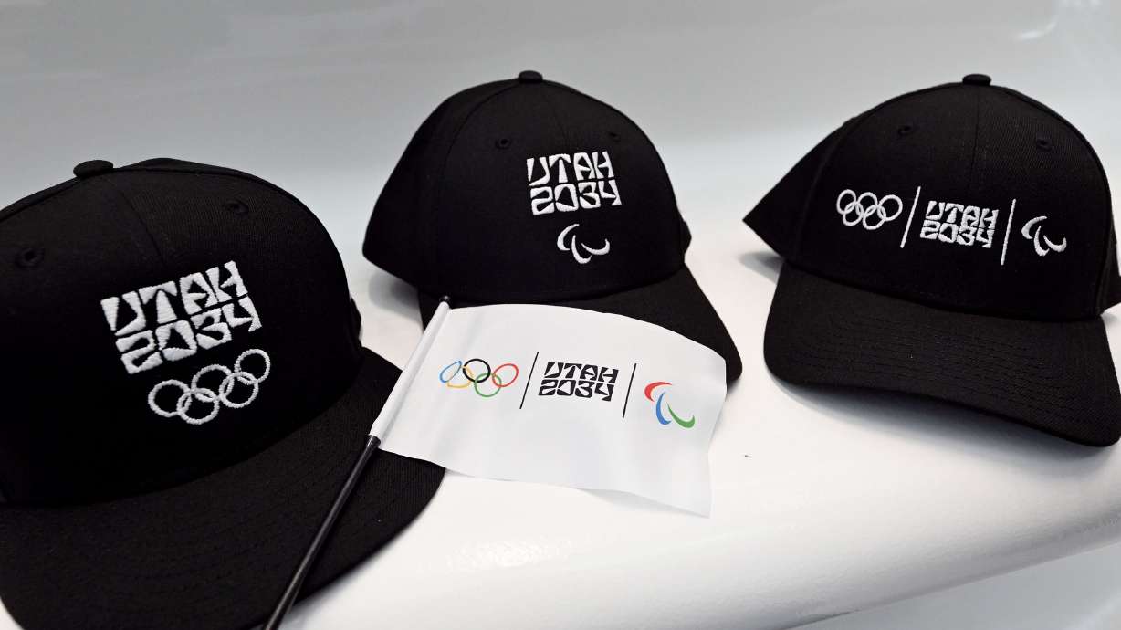 A sample of Olympic hats are shows during a ceremony at the Salt Lake City International Airport on Nov. 24..