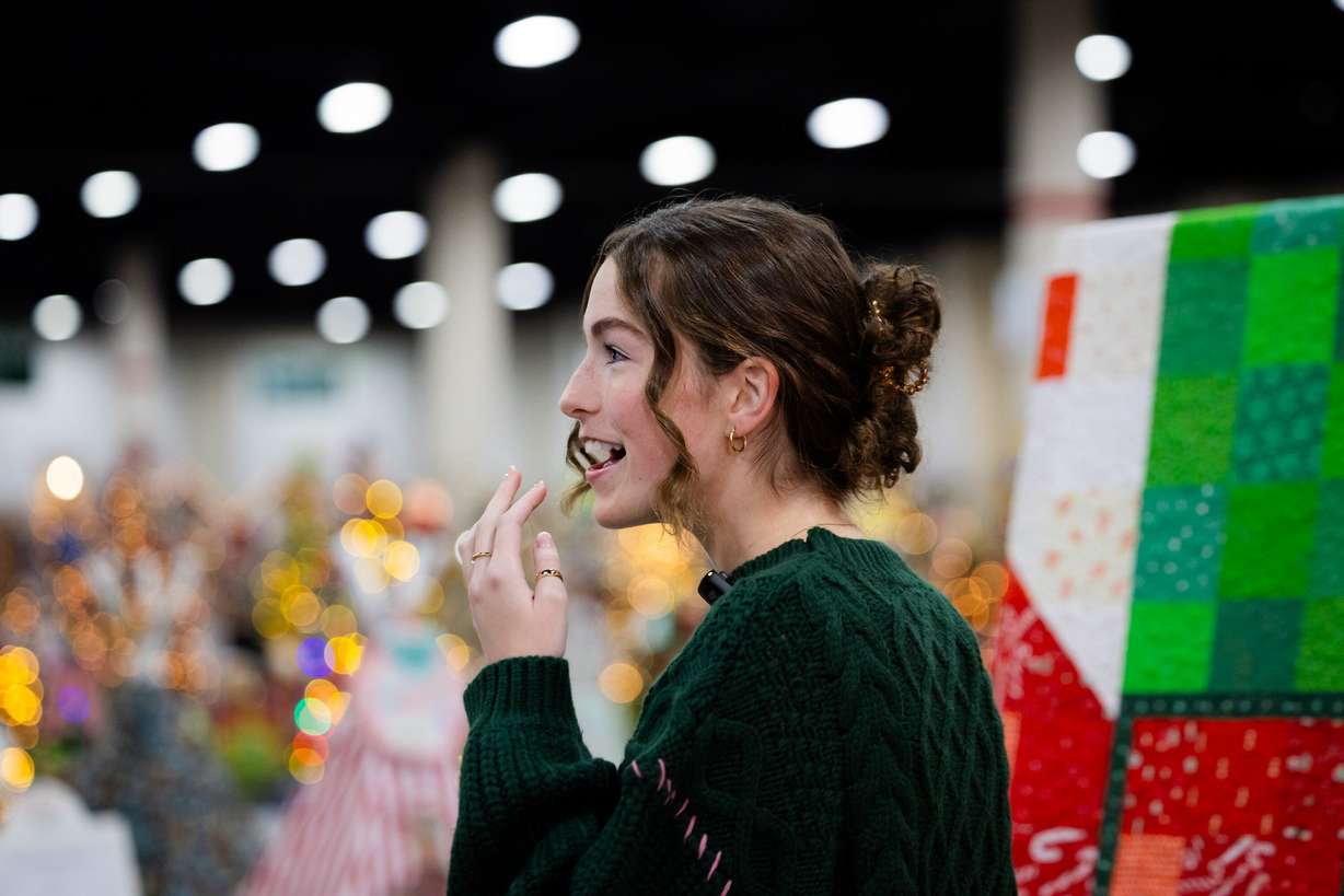 Livie Smart, 17, patient champion for this year’s Festival of Trees, reacts to seeing a tree made in her honor at the Mountain America Expo Center in Sandy on Tuesday. Funds raised at the Festival of Trees support the Primary Children’s Hospital.