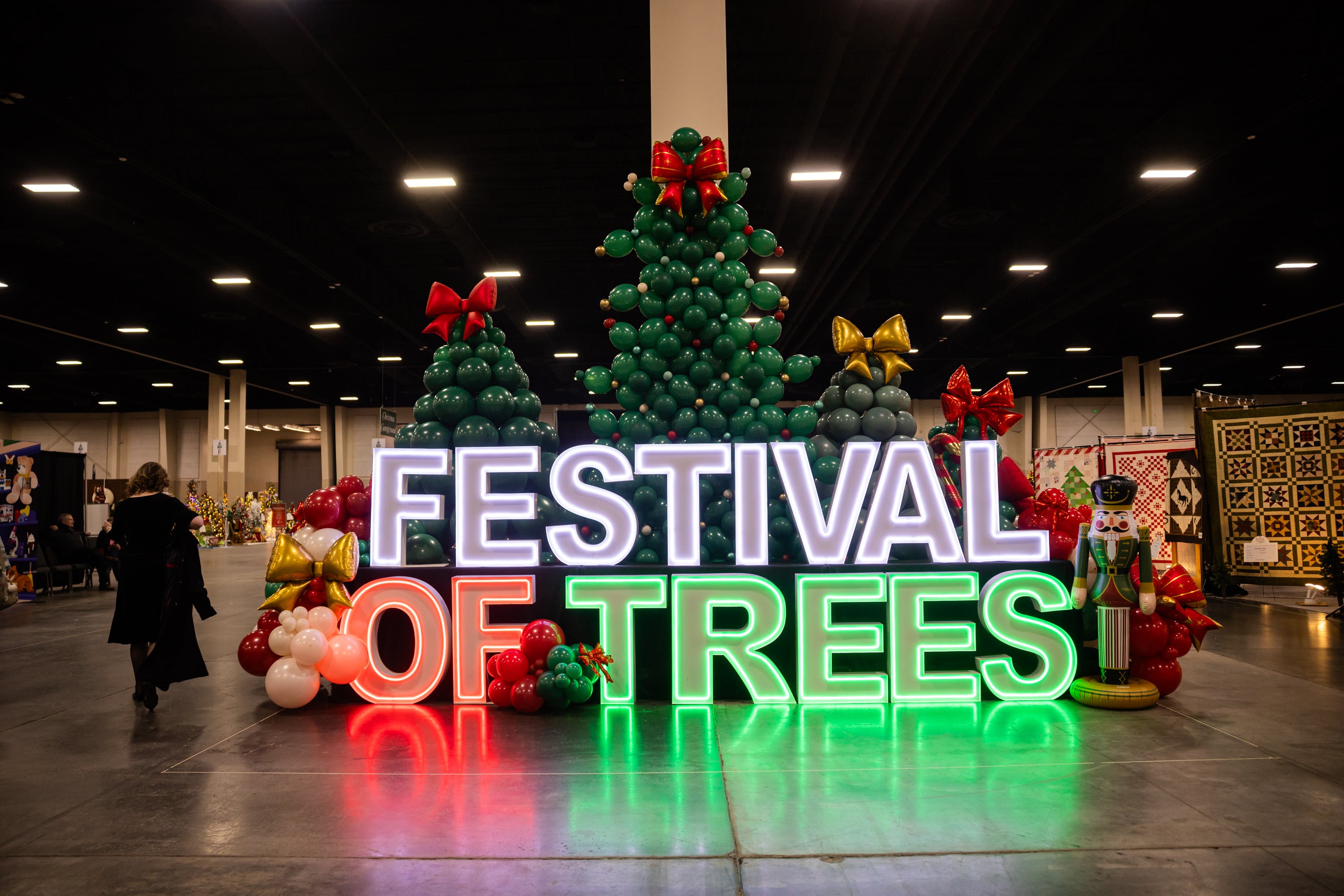 People set up for this year’s Festival of Trees at the Mountain America Expo Center in Sandy on Tuesday. Funds raised at the Festival of Trees support the Intermountain Health Primary Children's Hospital.