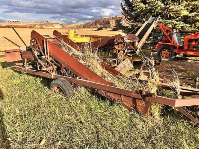 Mark Hoff’s potato harvester sits idle on the family farm today.