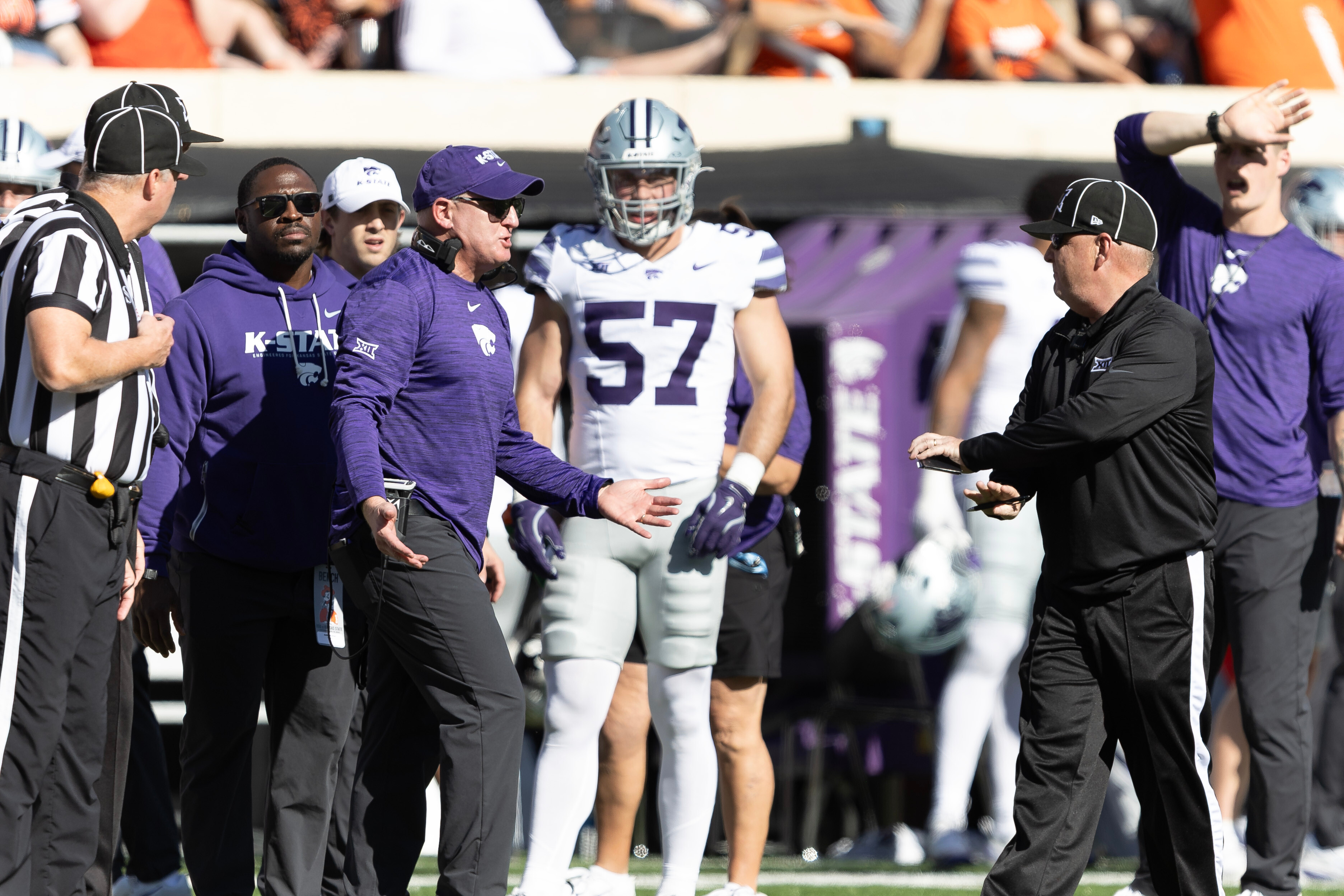 Kansas State head coach Chris Klieman talks to officials on the sidelines in the first half of an NCAA college football game against Oklahoma State Saturday, Nov. 15, 2025, in Stillwater, Okla.
