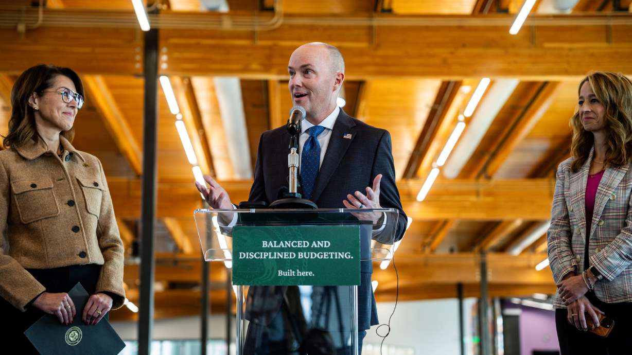Gov. Spencer Cox speaks about the fiscal year 2026-27 budget rollout at a press conference at Kearns Library in Kearns on Wednesday.