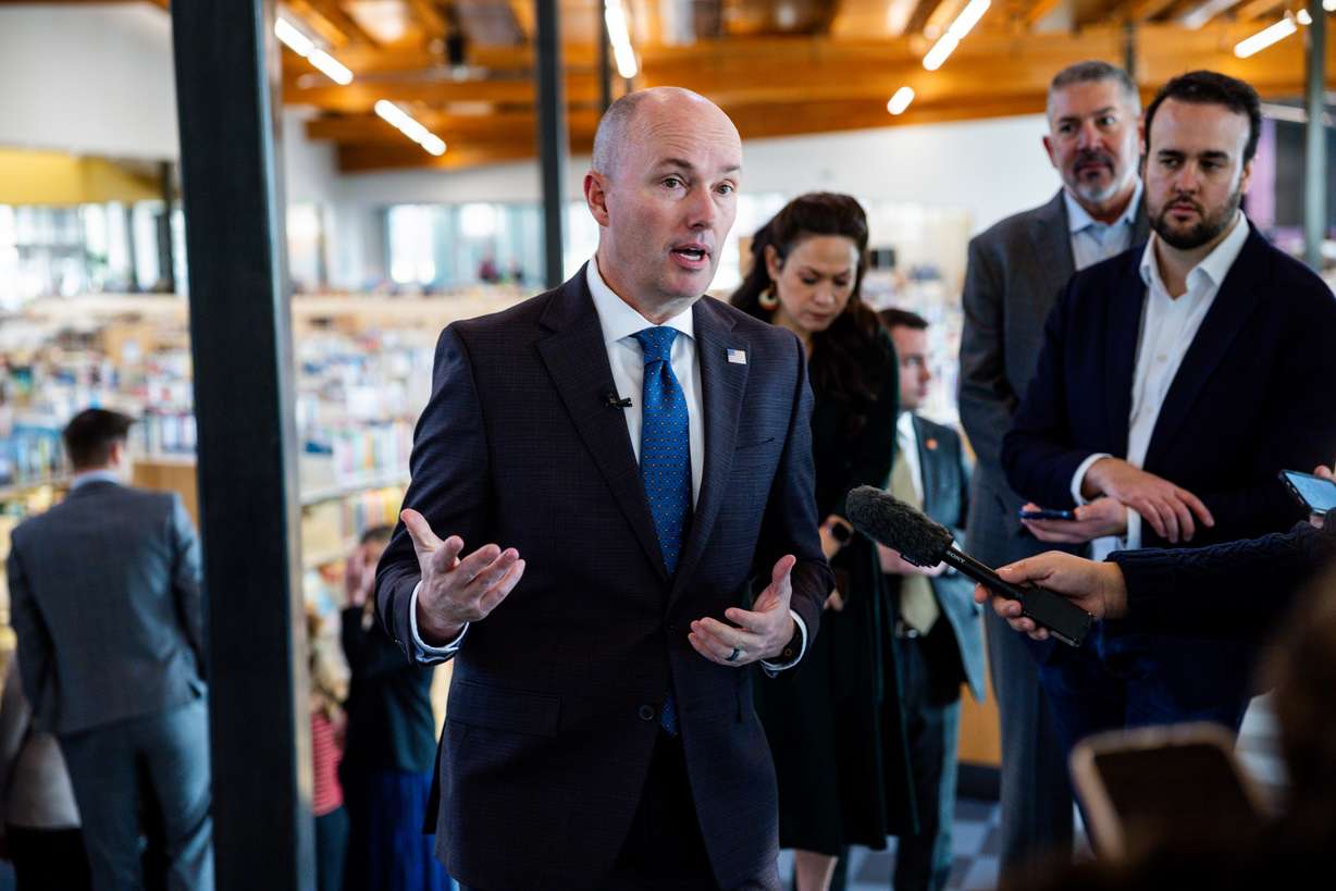 Gov. Spencer Cox speaks to reporters after speaking about the fiscal year 2026-27 budget rollout at a press conference at Kearns Library in Kearns on Wednesday.
