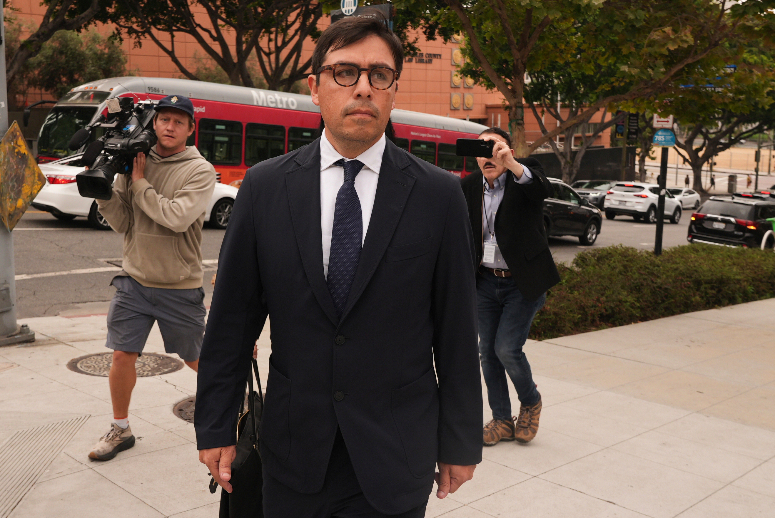 Dr. Salvador Plasencia leaves federal court on July 23 in Los Angeles, after pleading guilty to giving ketamine to Matthew Perry, leading up to the actor's 2023 overdose death. Plasencia was sentenced to 2 1/2 years in prison on Wednesday.