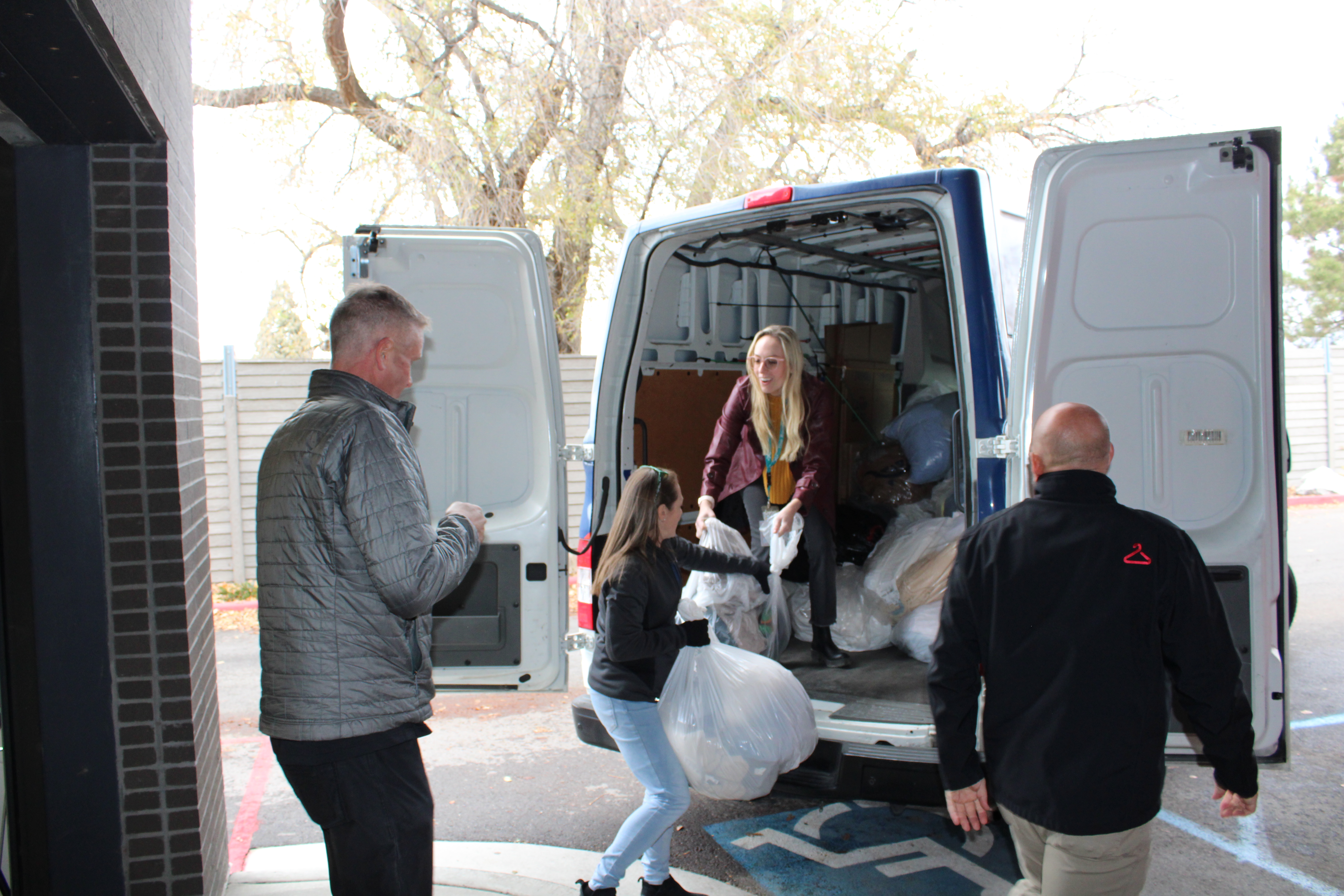 Bags of donated clothes being delivered as part of the 13th annual Warm Bodies, Warm Souls winter clothing drive on Wednesday.