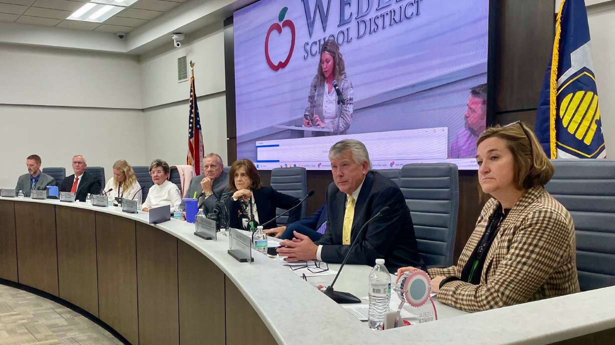 Weber School District officials voted Wednesday to keep Lomond View Elementary in Pleasant View open. Superintendent Gina Butters, right, and school board members are pictured at Wednesday's meeting in Washington Terrace.