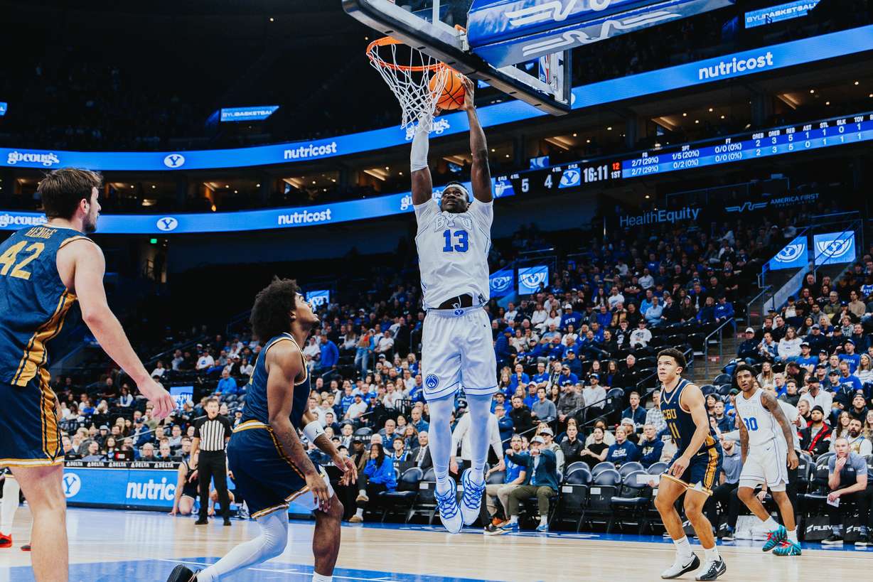 BYU's Keba Keita dunks during an NCAA college basketball game against California Baptist, Wednesday, Dec. 3, 2025 at the Delta Center in Salt Lake City.