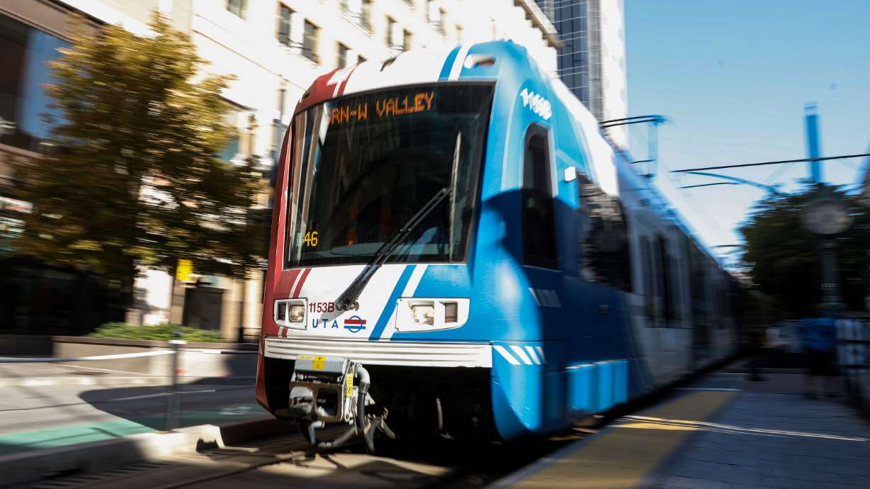 A Utah Transit Authority TRAX train arrives at the City Center Station in Salt Lake City on Sept. 15, 2021. TRAX lines were disrupted Thursday morning after a freight train derailed.