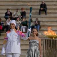 Olympic flame for Milan Cortina Winter Games arrives in Italy following handover in Greece