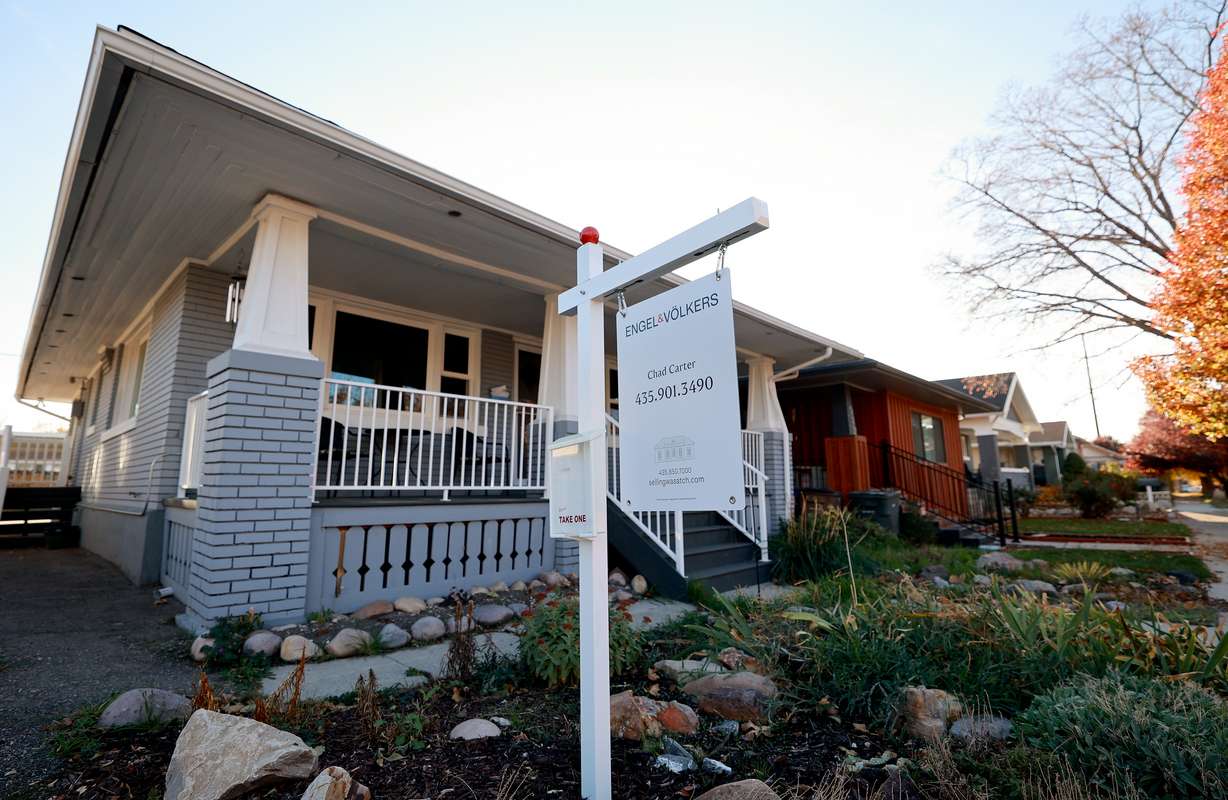 A for-sale sign is pictured outside a house in Salt Lake City on Nov. 11.