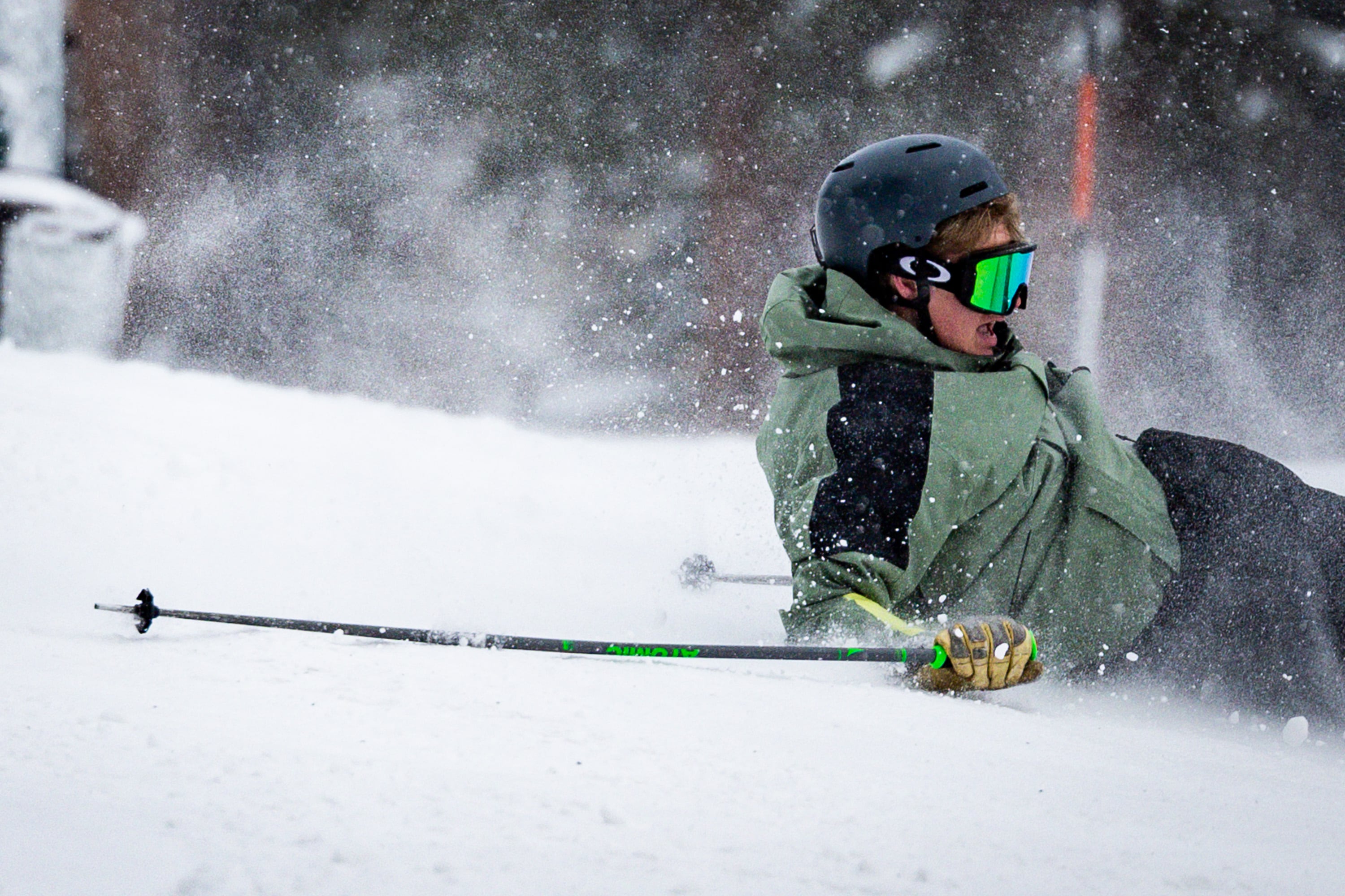 A skier crashes in the terrain park during opening day at Brighton Resort in Brighton on Tuesday.