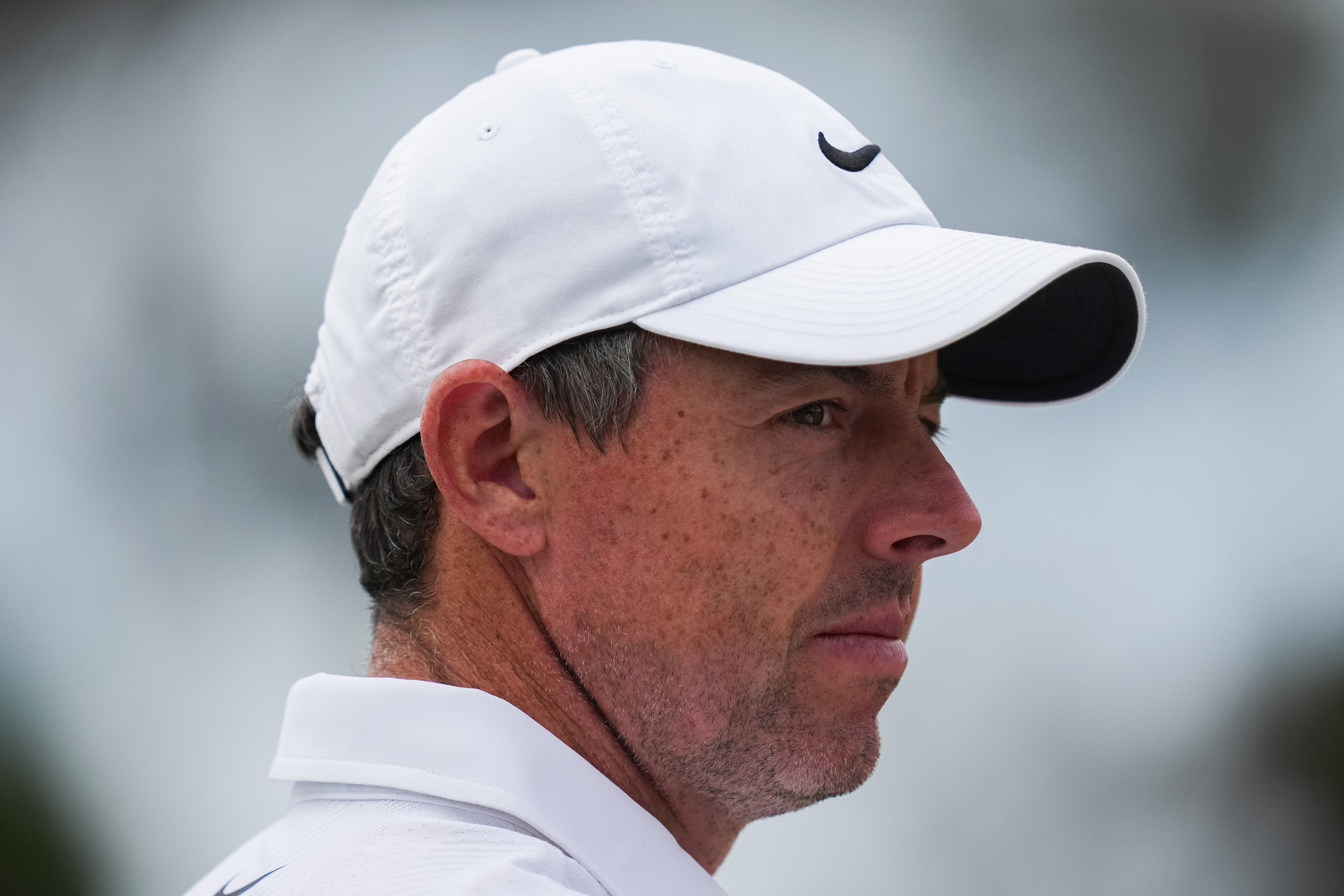 Rory McIlroy of Northern Ireland reacts during the first round of the Australian Open golf tournament in Melbourne, Australia, Thursday, Dec. 4, 2025.