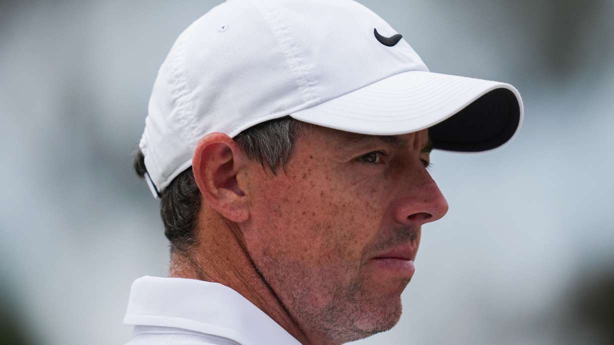 Rory McIlroy of Northern Ireland reacts during the first round of the Australian Open golf tournament in Melbourne, Australia, Thursday, Dec. 4, 2025.