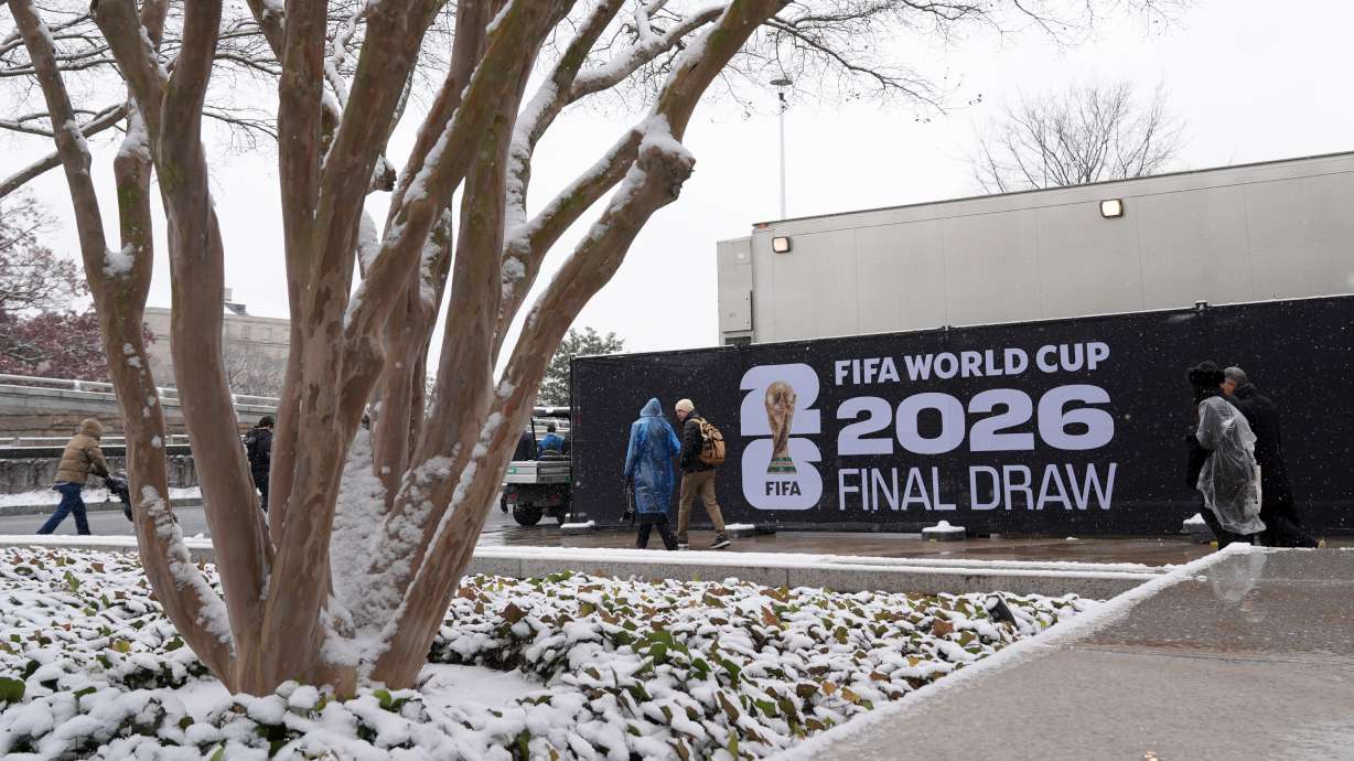 People arrive for the draw for the 2026 soccer World Cup at the Kennedy Center in Washington, Friday, Dec. 5, 2025.
