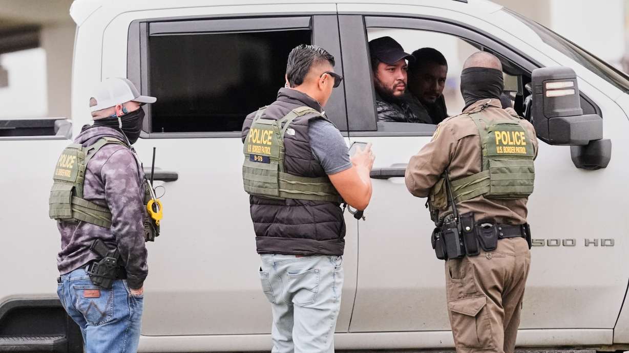 Utah immigration attorneys say immigration officials plan to augment enforcement action starting next Monday, Dec. 8, in Salt Lake City. The Dec. 5 photo shows Customs and Border Patrol agents during immigration crackdown efforts in Louisiana.