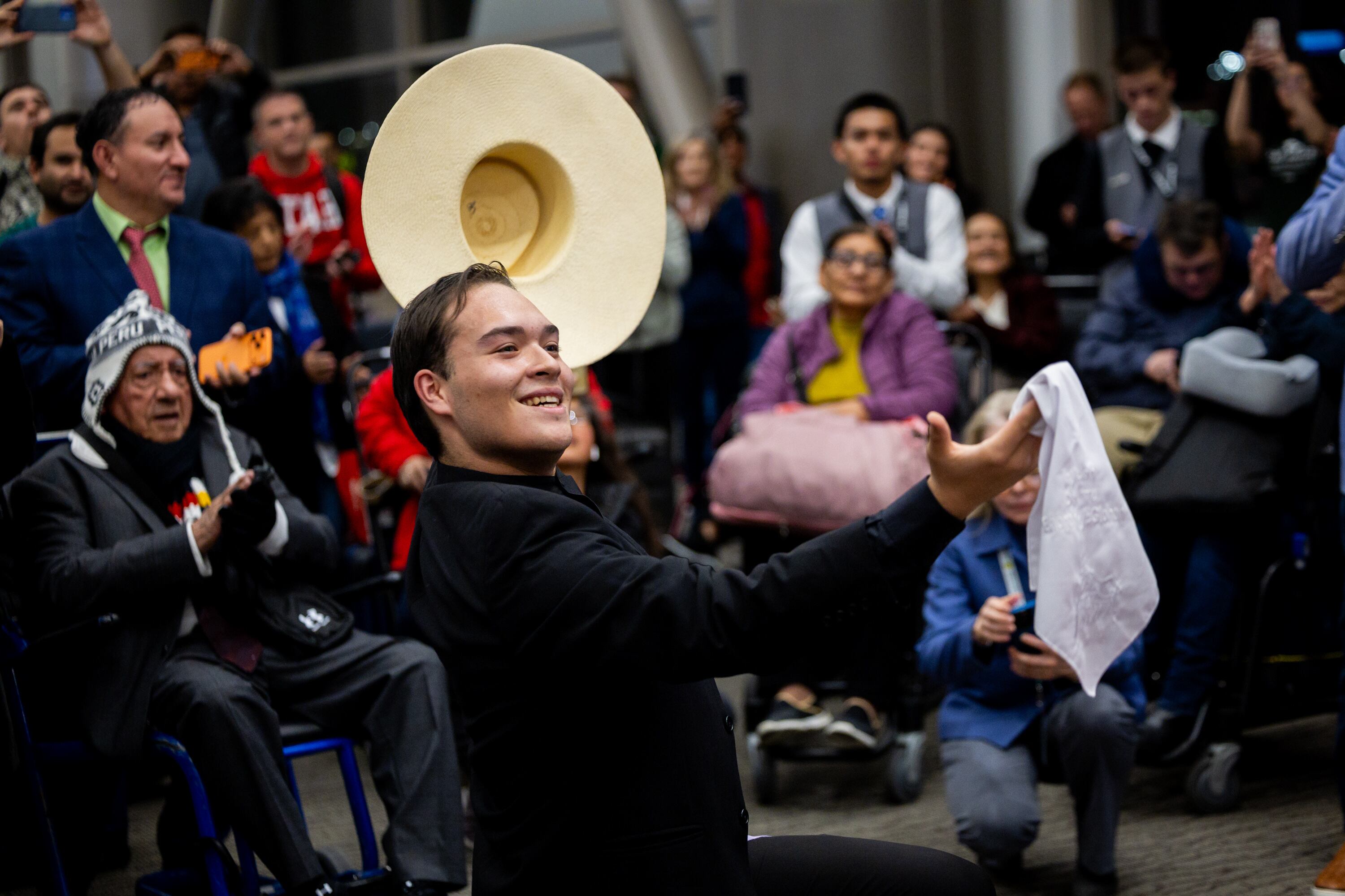Ryan Dos Santos, 18, dances at the gate before Delta’s maiden flight from Salt Lake City to Lima, Peru, operating daily seasonal service using a Boeing 767-300ER until Jan. 25, 2026, at the Salt Lake City International Airport in Salt Lake City on Thursday. It was one of many celebratory dances and speeches as part of the leadup to the flight.