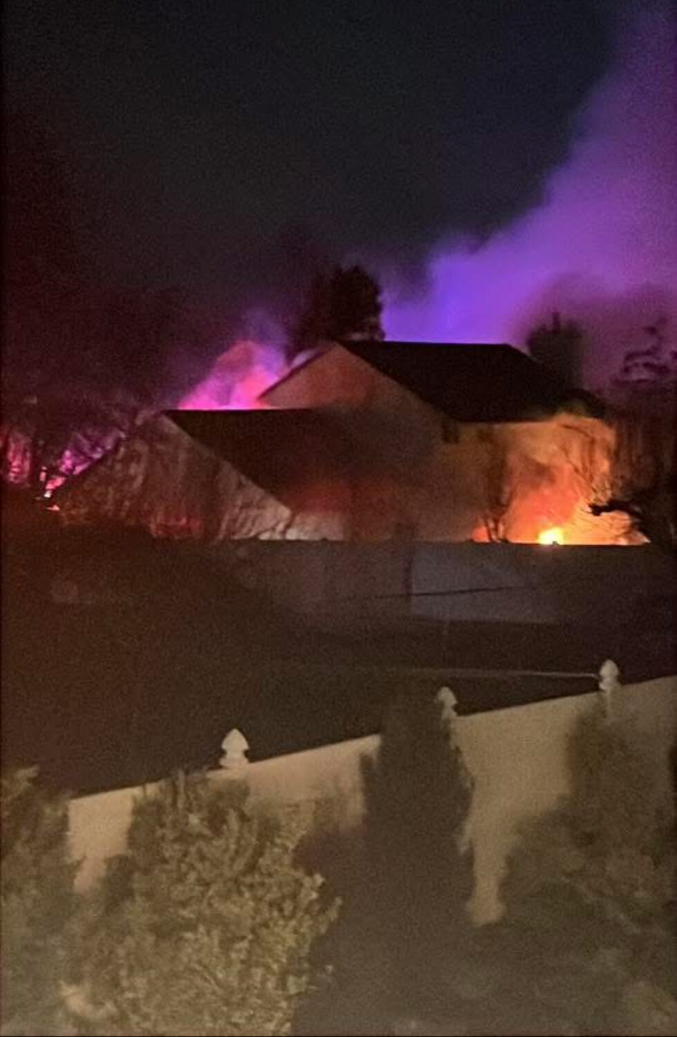 The Richardson family's house on fire, Sunday. A neighbor called the family to let them know of the blaze.