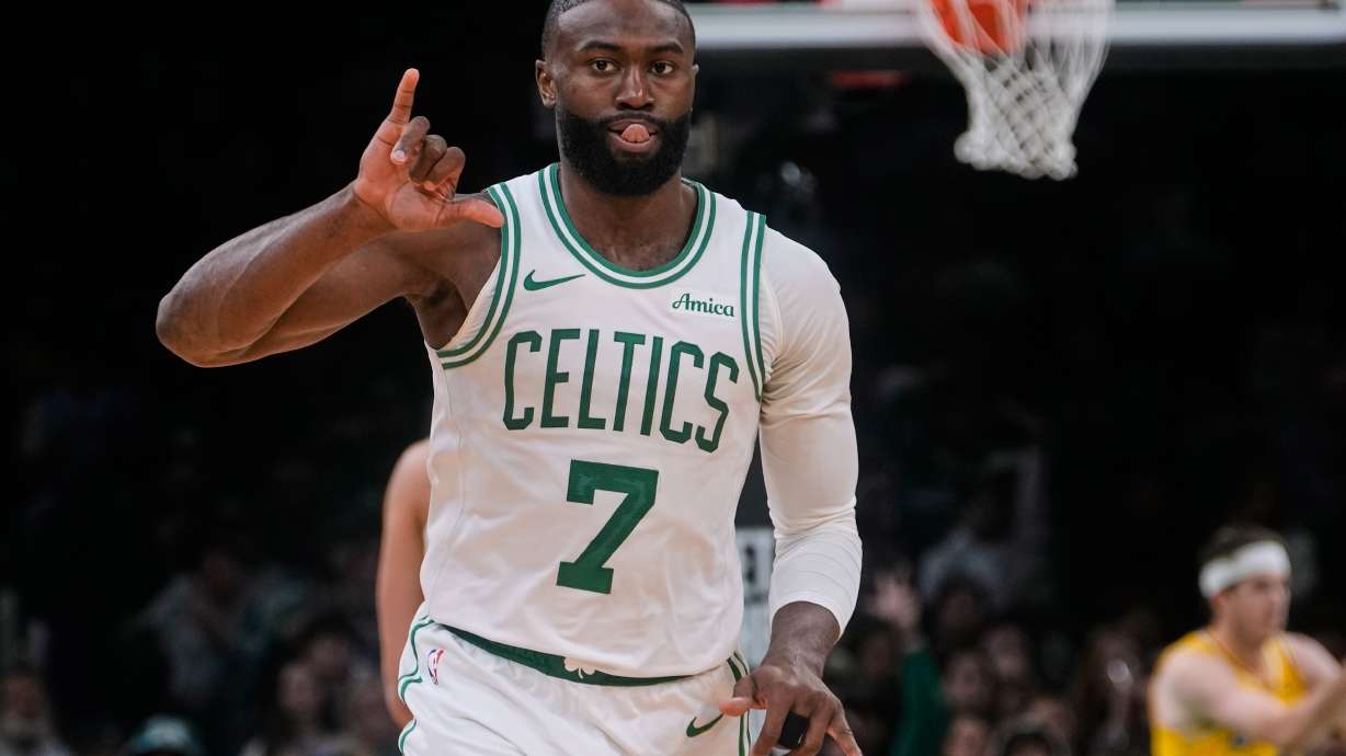 Boston Celtics guard Jaylen Brown celebrates after making a 3-point basket during the second half of an NBA basketball game against the Los Angeles Lakers, Friday, Dec. 5, 2025, in Boston.
