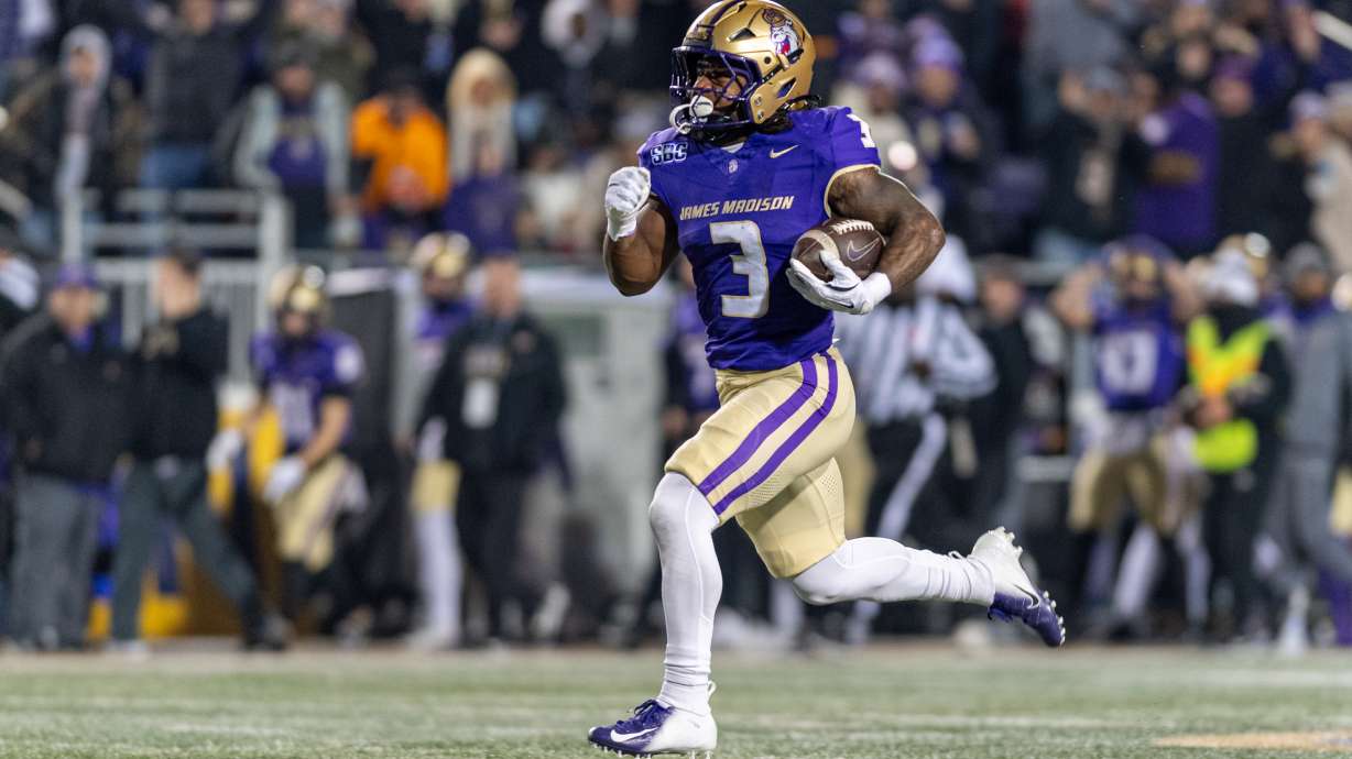 James Madison running back Wayne Knight (3) runs the ball for a touchdown against Troy during the first half of the Sun Belt Championship NCAA college football game, Friday, Dec. 5, 2025, in Harrisonburg, Va.