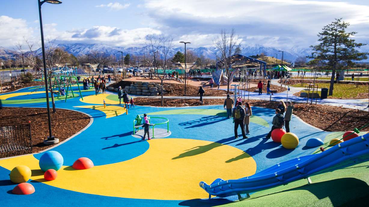 Families test out the amenities at Glendale Regional Park in Salt Lake City on Saturday. The former site of the old Raging Waters water park is now the city’s first regional park in over 60 years.