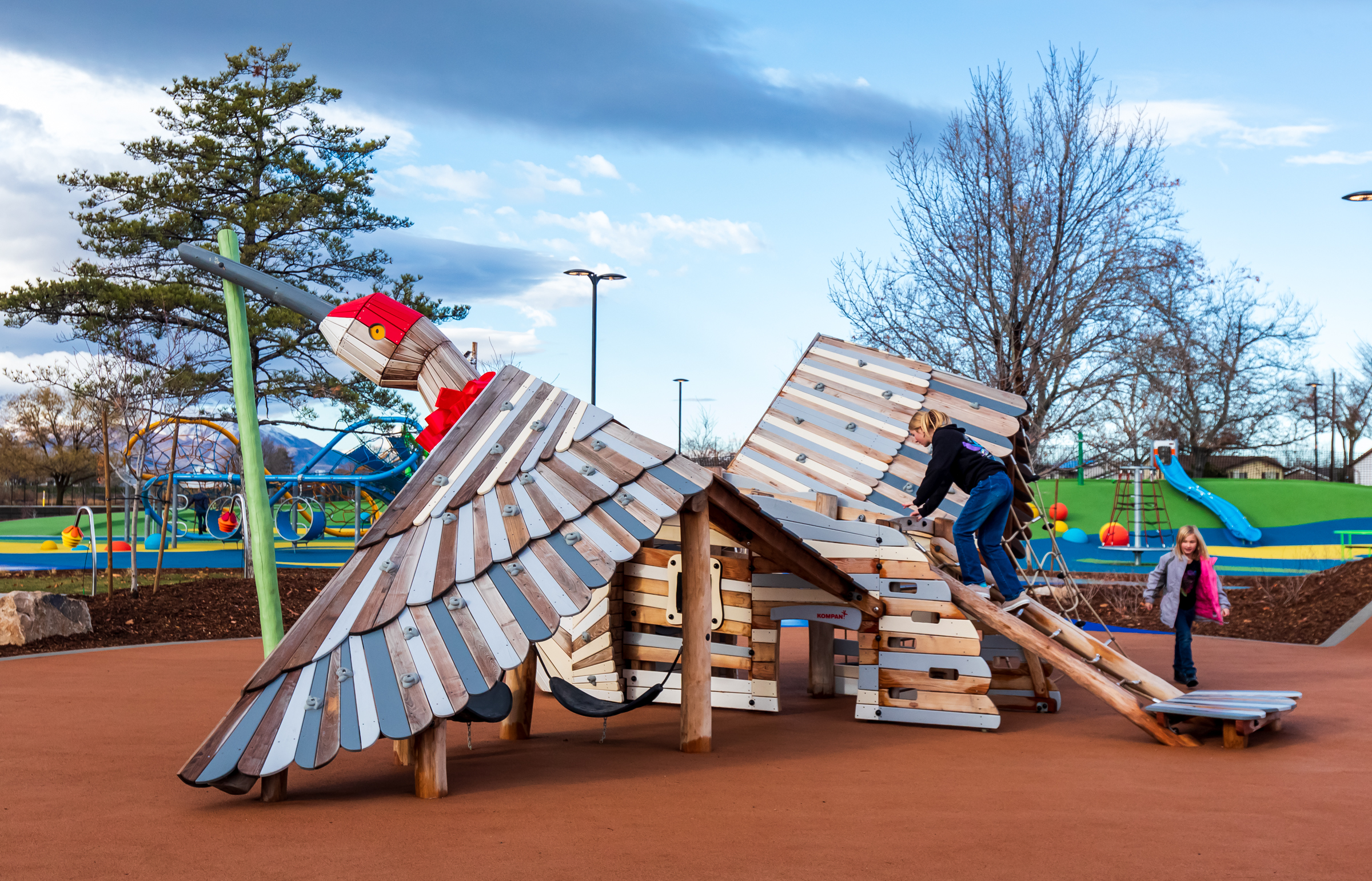 Children play on a sandhill crane-shaped climbing structure at Glendale Park in Salt Lake City on Saturday. The former site of the old Raging Waters water park is now the city’s first regional park in 68 years.
