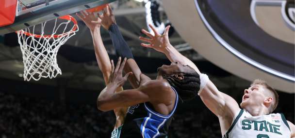 Cameron Boozer scores 18 in No. 4 Duke's 66-60 win over No. 7 Michigan State